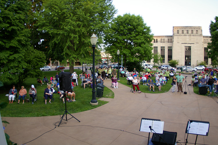 A large crowd gathers in Washington Park for the Tree of Life Memorial Service.
